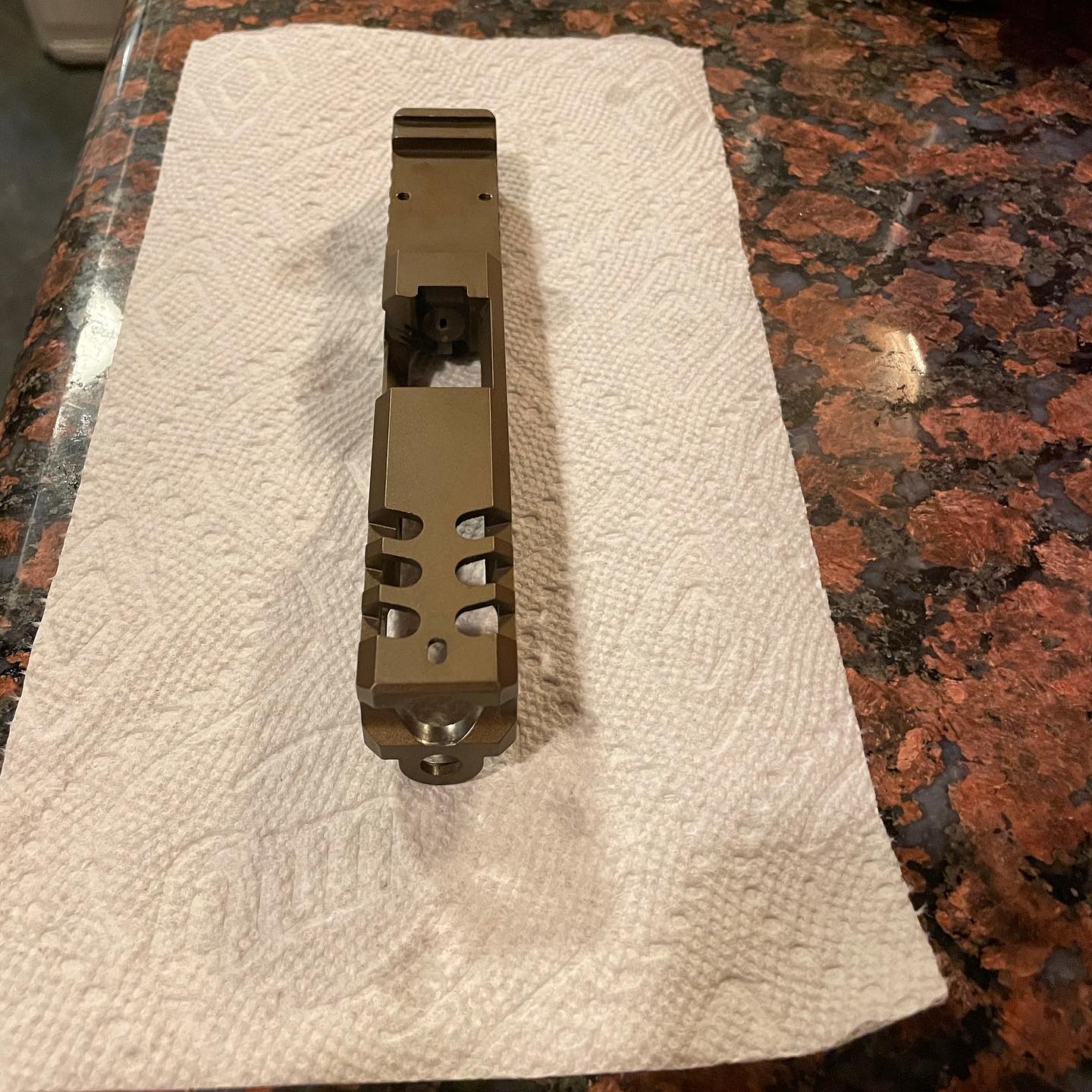 From Ghetto Gold to Back n black. Quick redcoat on a Lightened Glock slide.